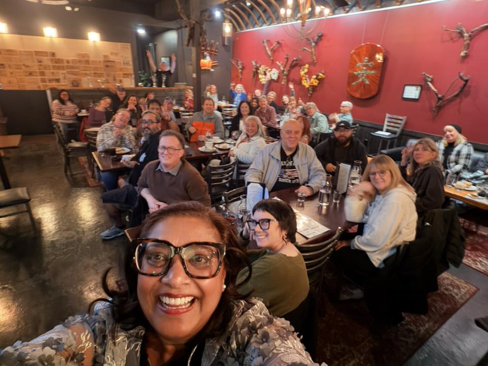 mona das leading a group of people