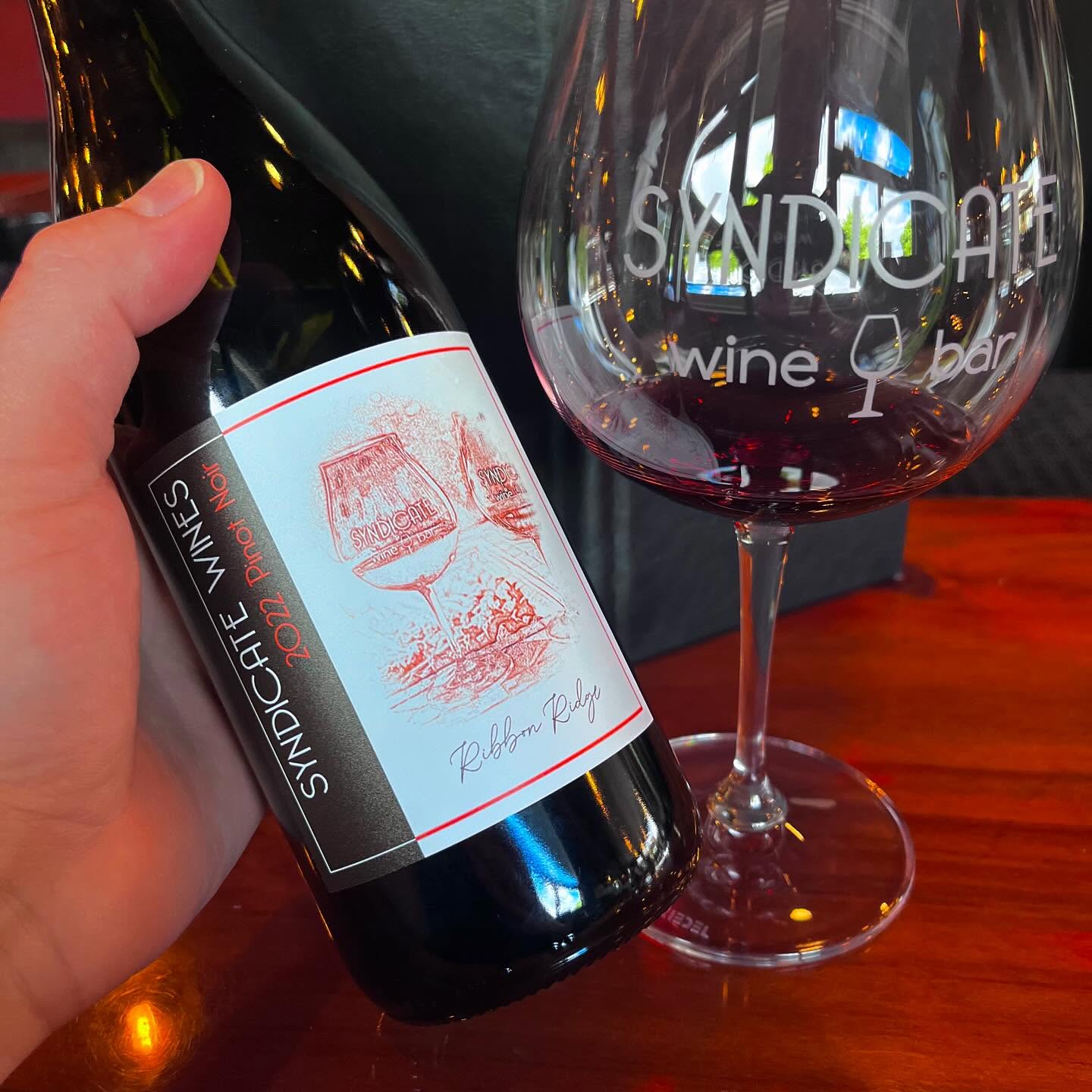 a bottle of syndicate ribbon ridge pinot noir