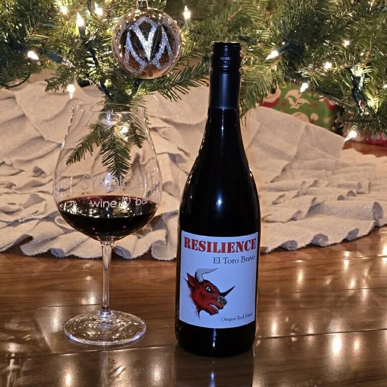 el toro bravo under a christmas tree